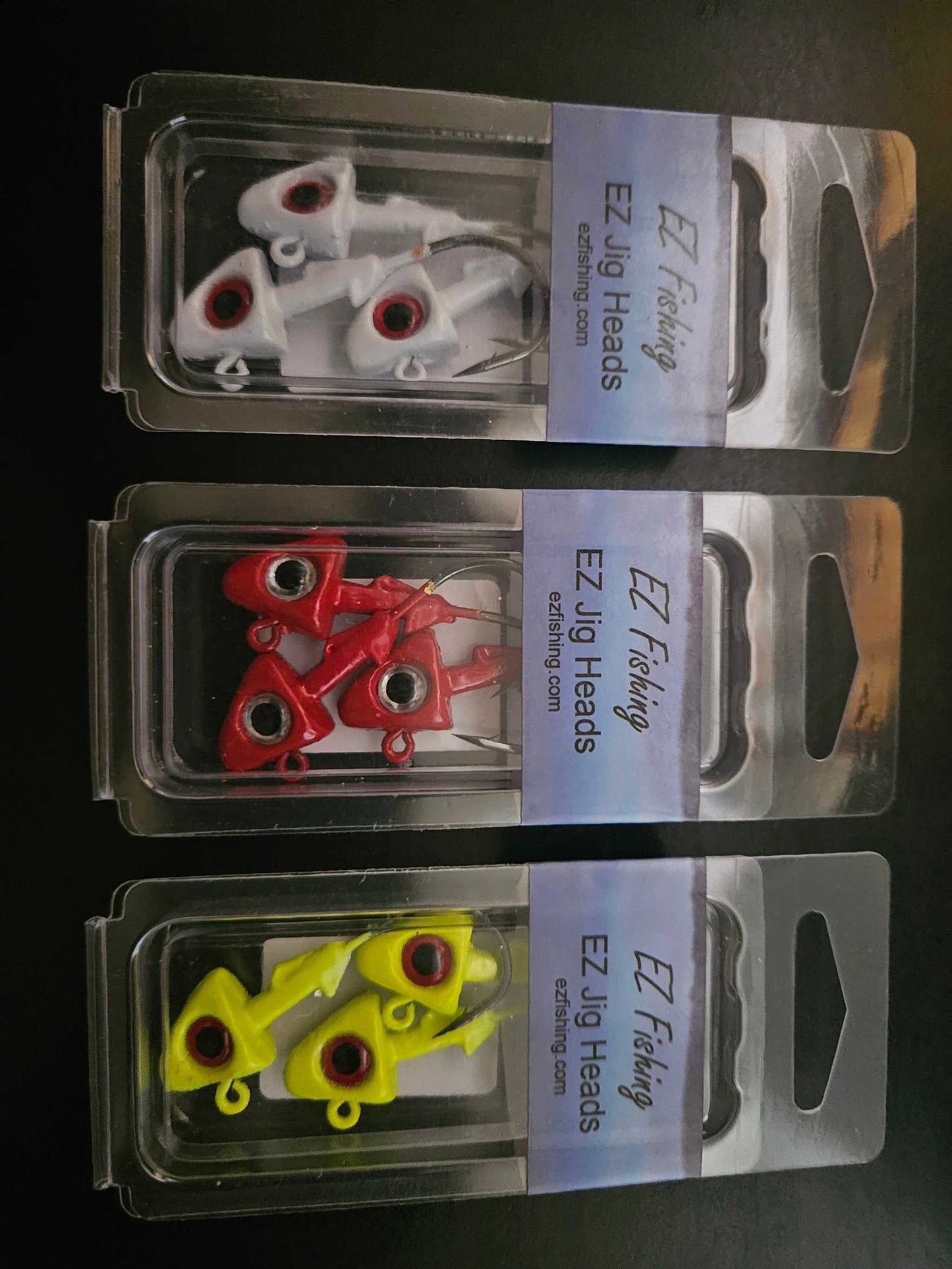 a picture show three packages of different color EZ Jig Heads
