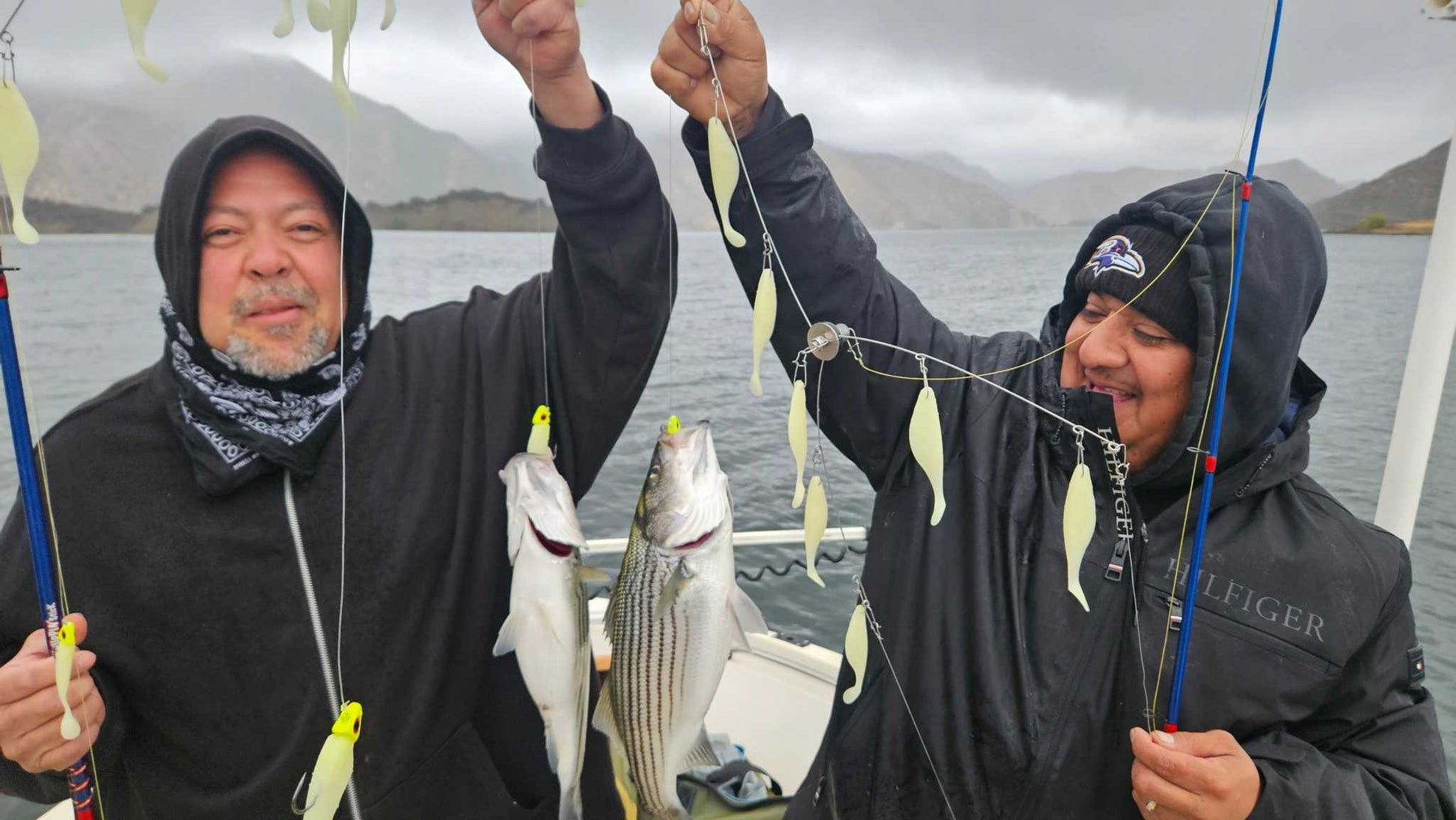 Guide Service, 2 guys holding up 2 fish caught on 2 EZ U-Rigs