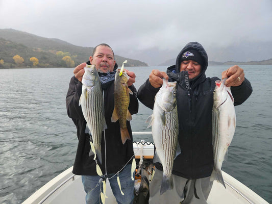 Guide Service, 2 guys holding up 4 fish caught on 2 EZ U-Rigs