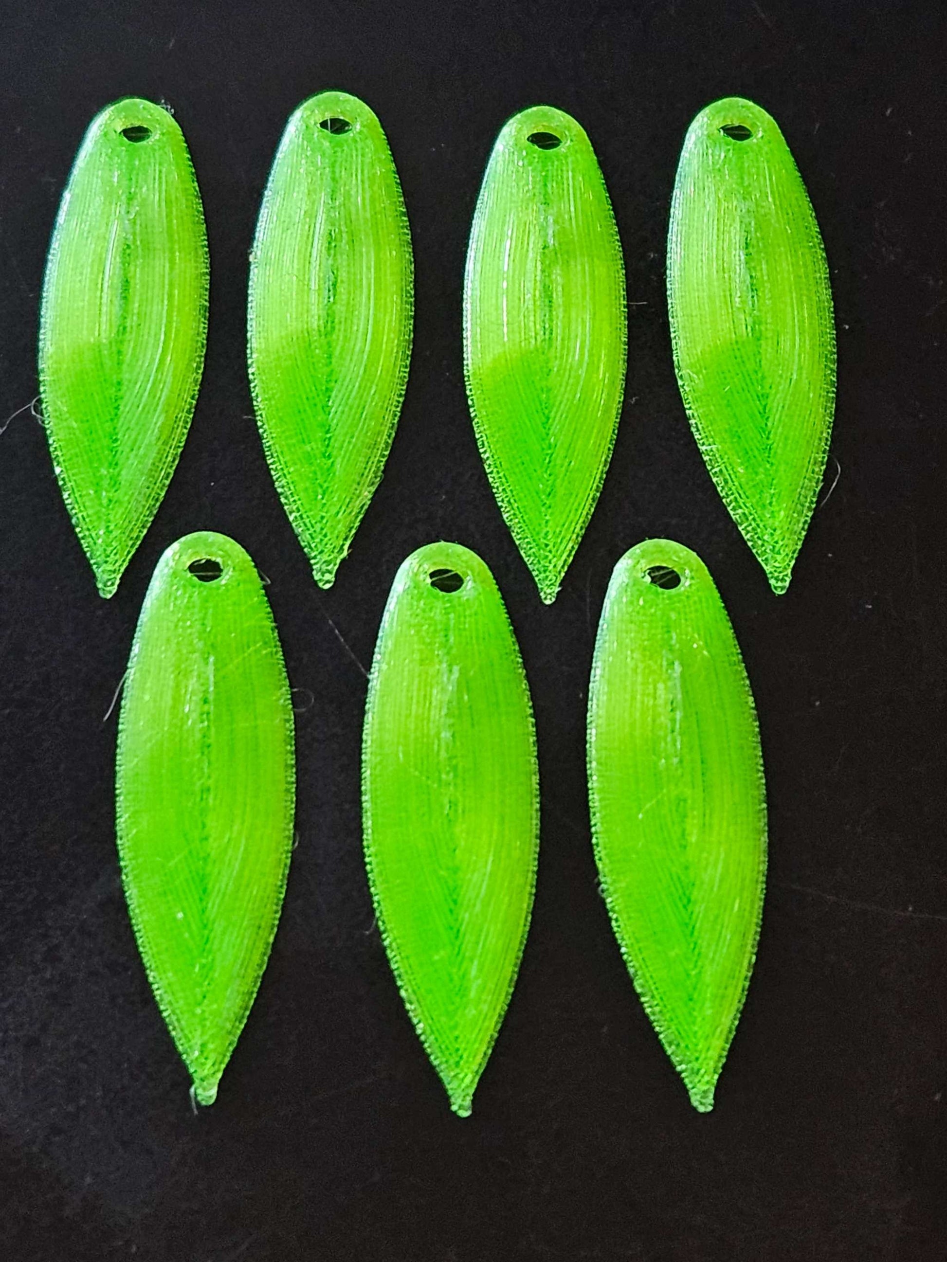 a picture showing 7 Chartruese EZ Fishing 1.75" EZ TPU Spinner Blades