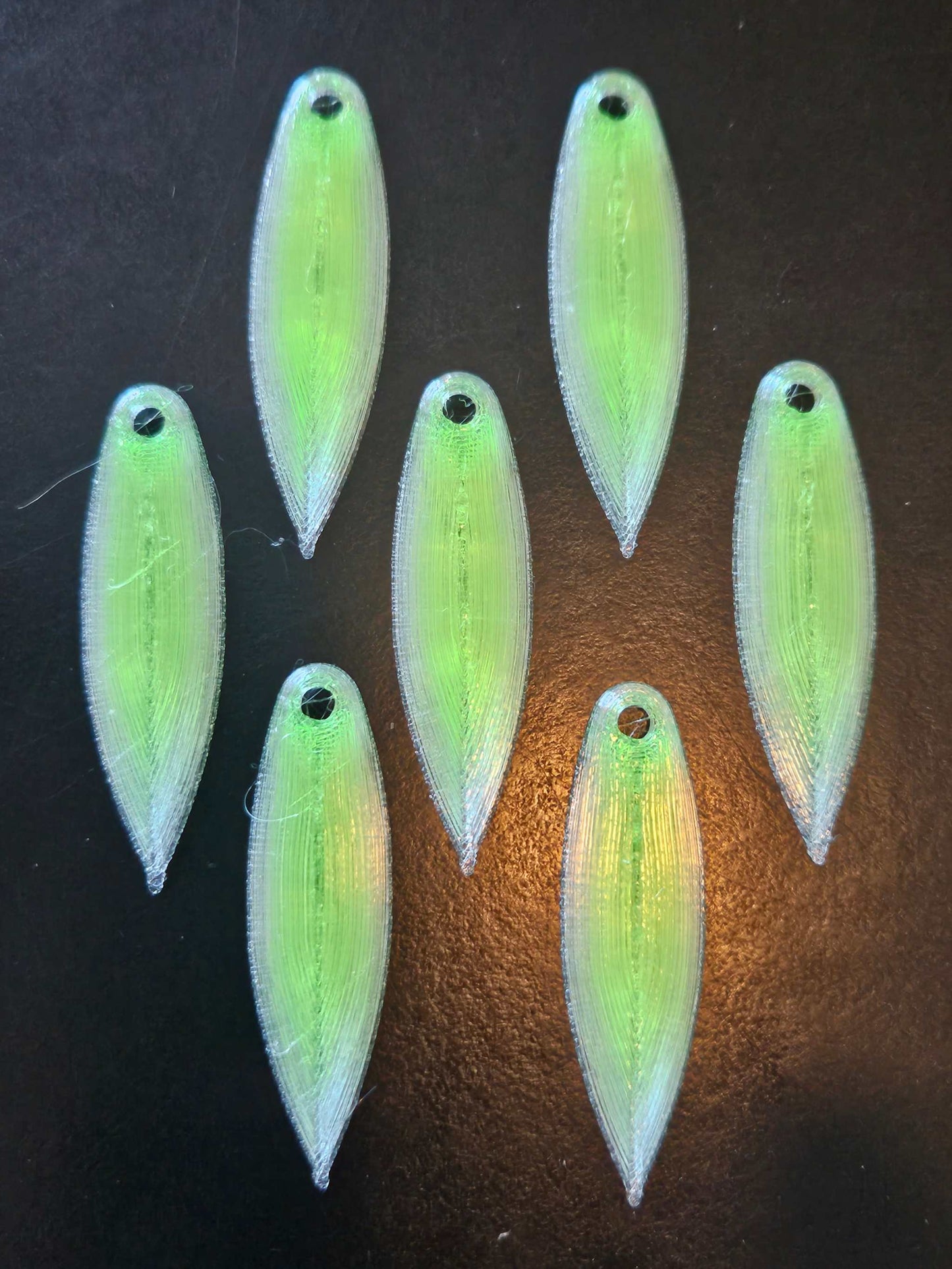 a picture showing 7 Chartruese with a White border EZ Fishing 1.75" EZ TPU Spinner Blades