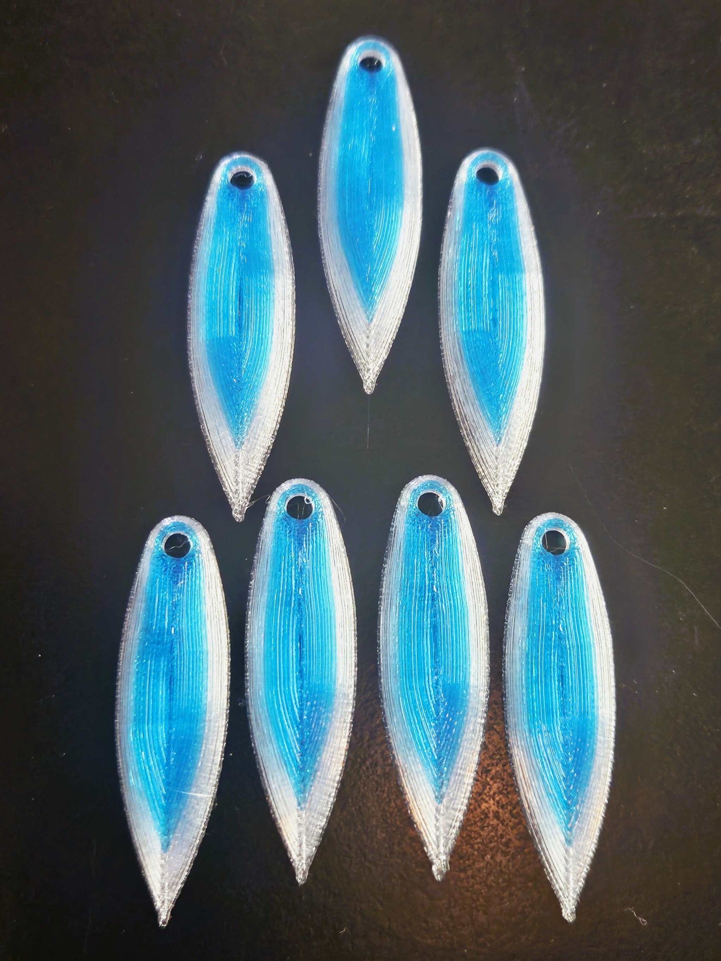 a picture showing 7 Blue with a White border EZ Fishing 1.75" EZ TPU Spinner Blades