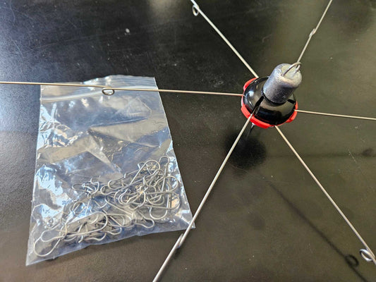 umbrella rig, A picture of an opned EZ U-Rig Blitz, 6 Arm folding umbrella rig with the include duolock snaps.